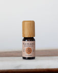 A 10ml vial of Anise pure essential oil with attractive bamboo wood top offers a warm, spicy solution to soothe worries and promote relaxation that is steam distilled from the brown pods of the white-flowering Pimpinella anisum plant.