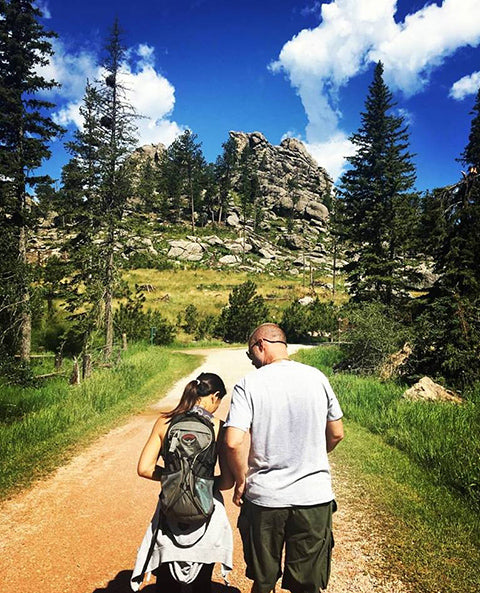 Natural life of Komoni founder hiking towards Black Elk Peak in South Dakota. 