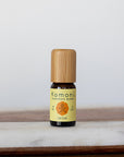 Detox proprietary blend of pure essential oils in 10 mL bottle with bamboo wood top.