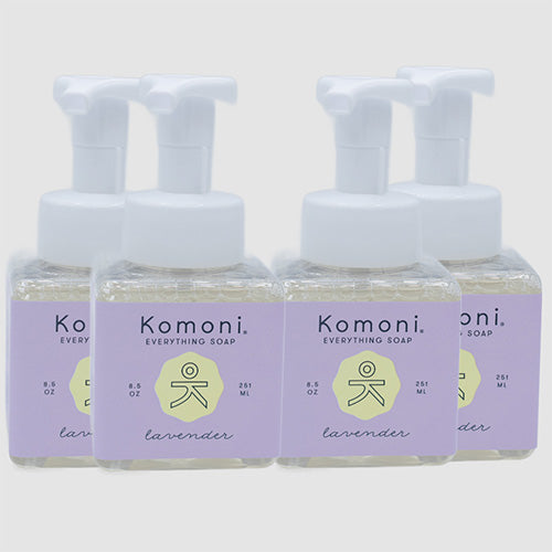 Four square, light-purple, 8.5 oz. foaming pump bottles filled with lavender essential oil all-in-one everything soap for your kitchen or bathroom sink. 