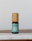 A 10ml vial of Eucalyptus pure essential oil with attractive bamboo wood top provides a natural solution for respiratory relief, skin health, and stress reduction.