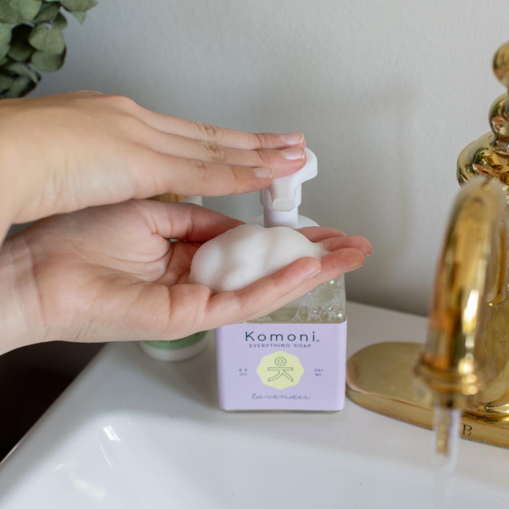 Hands dispense a foam of the Lavender Everything soap for your kitchen or bathroom sink. Plant-based soap blends soothing essential oils with gentle botanicals to provide an all-natural clean. Ideal for hands, dishes, and countertops.