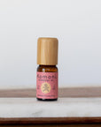 A 10ml vial of Geranium pure essential oil with attractive bamboo wood top offers a sweet, uplifting floral aroma with a hint of mint that helps you relax and reconnect. 