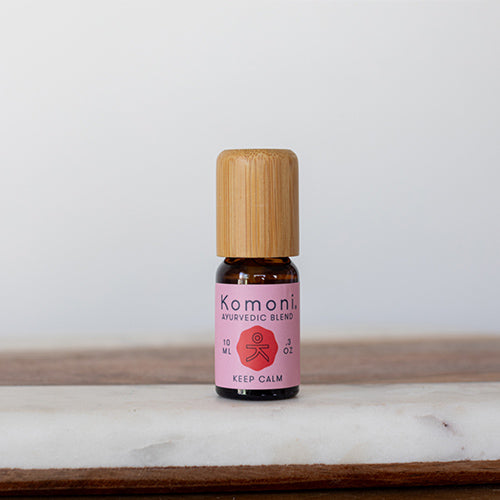 KEEP CALM proprietary blend of pure essential oils in 10 mL bottle with bamboo wood top.