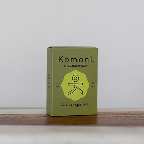 4 oz. Lemongrass essential oil face & body cleanser bar shown in its avocado green box.