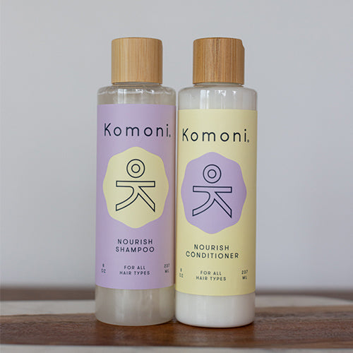 Two 8 oz. bottles of Nourish lavender essential oil Shampoo & Conditioner.