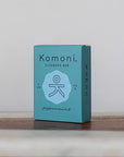 Peppermint essential oil face & body cleanser bar shown in sea-foam blue box.