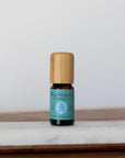 A 10 mL vial of Peppermint Essential Oil with attractive bamboo wood top offers a natural, uplifting, crisp, cool aroma that instantly invigorates the senses, helping to ease tension and improve concentration.