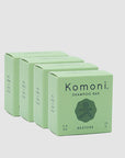 4 RESTORE concentrated eco-friendly essential oil shampoo bars shown in a row of pastel green boxes.