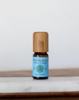 Recovery Ayurvedic proprietary blend of pure essential oils in 10 mL bottle with bamboo wood top soothes muscle aches and promoted healing with lavender, peppermint, rosemary, and wintergreen.