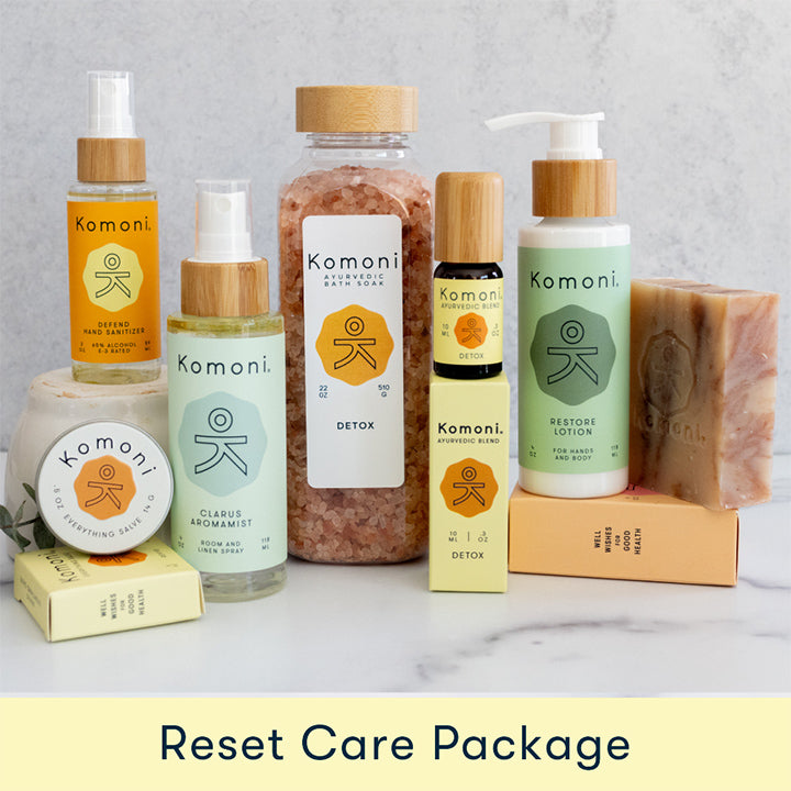 Reset Care Package includes DETOX Bath Soak, DEFEND Hand Sanitizer, Grapefruit & Geranium Essential Oil Cleanser Bar, RESTORE Lotion, CLARUS Aromamist, 10 mL bottle of DETOX Essential Oil Blend, and REVIVE Everything Salve.