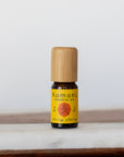 Ylang-Ylang pure essential oil in 10 mL bottle with bamboo wood top.