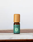 Camphor pure essential oil in 10 mL bottle with bamboo wood top.