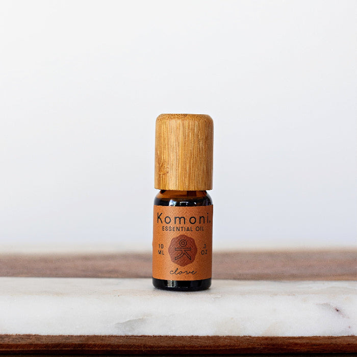 A 10ml vial of Clove pure essential oil with attractive bamboo wood top.