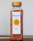 22 oz. bottle of Detox bath soak signature Himalayan Salt formula with bamboo wood top.