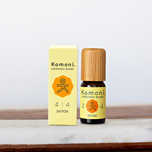 A 10ml vial of DETOX pure essential oil blend with attractive bamboo wood top.