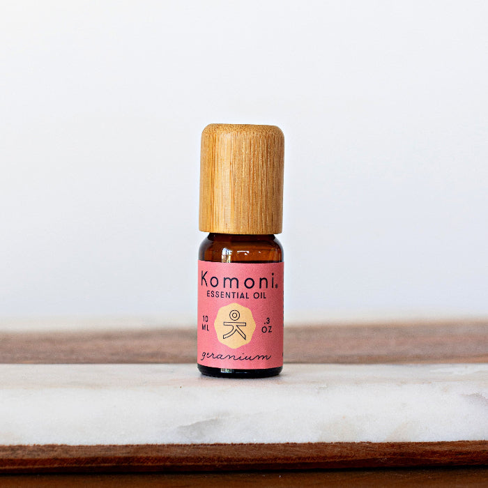 A 10ml vial of Geranium pure essential oil with attractive bamboo wood top.