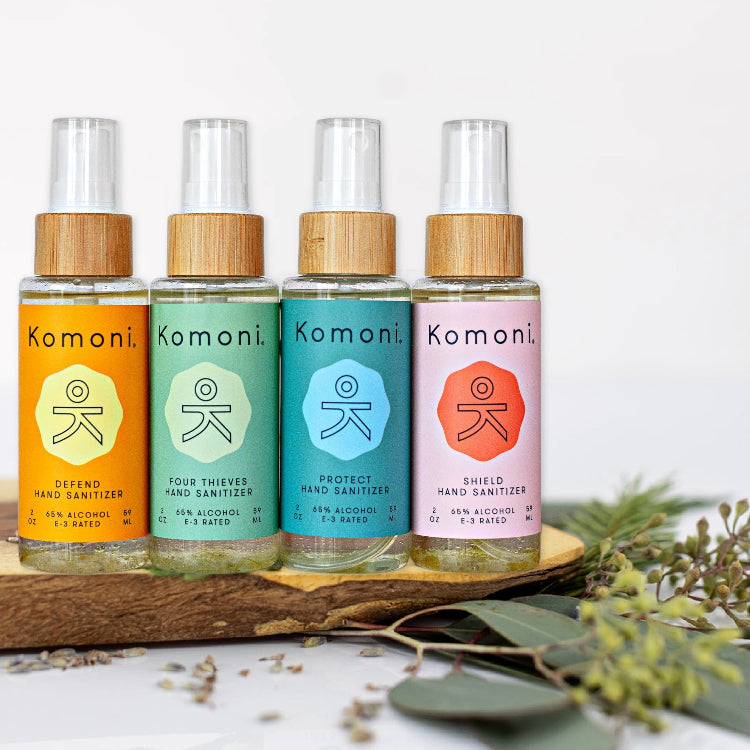 1 of each of the four essential oil signature blend moisturizing hand sanitizers in attractive wooden top pump spray bottles.