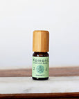 IMMUNITY proprietary blend of pure essential oils in 10 mL bottle with bamboo wood top.