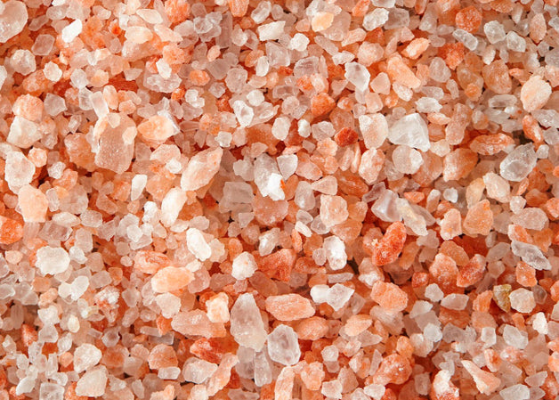 Close up of pure pink Himalayan Salt coarse grain crystals. 