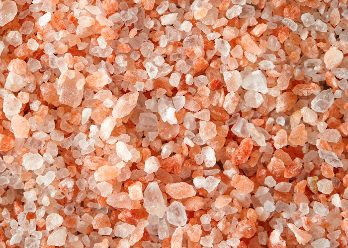 Close up of pure pink Himalayan Salt coarse grain crystals. 