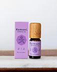 A 10ml vial of Lavender pure essential oil with attractive bamboo wood top beside box packaging.