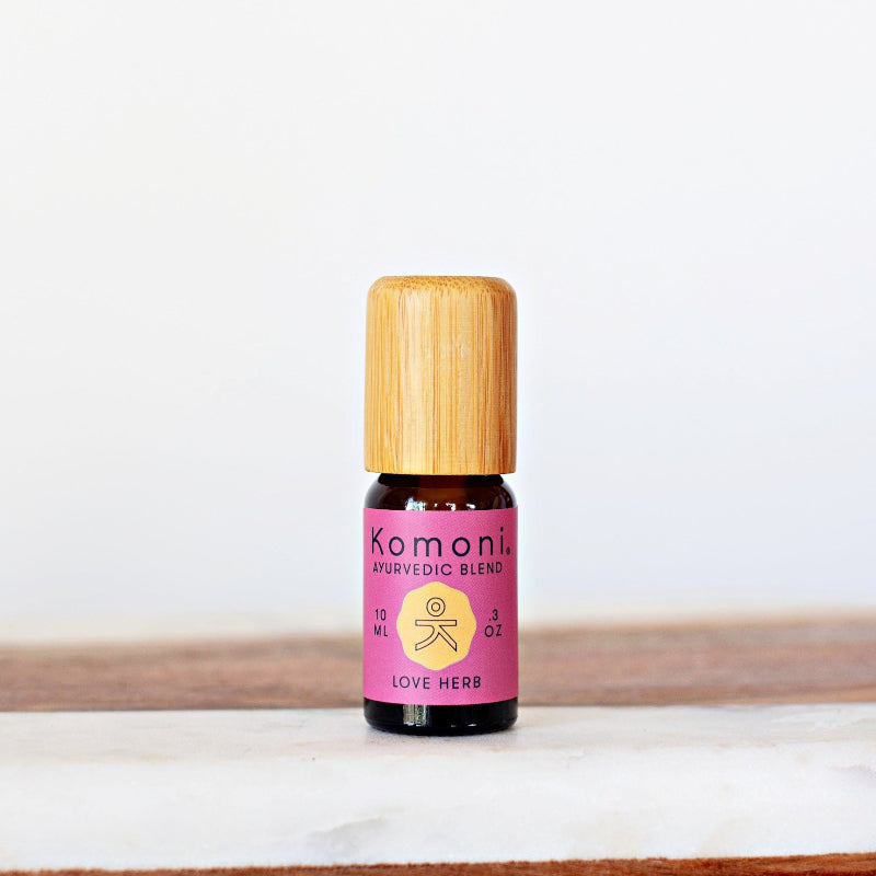 10ml vial of Love-Herb pure essential oil blend with attractive bamboo wood top.