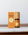 A 10ml vial of Orange pure essential oil with attractive bamboo wood top next to box packaging.