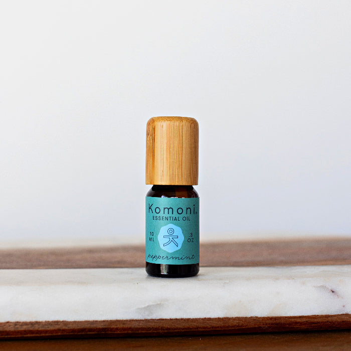 A 10 mL vial of Peppermint Essential Oil with attractive bamboo wood top.