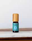 A 10 mL vial of Peppermint Essential Oil with attractive bamboo wood top.