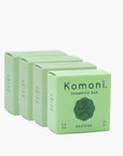 4  pastel green boxes of RESTORE concentrated eco-friendly essential oil shampoo bars. 