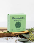 RESTORE concentrated eco-friendly essential oil shampoo bar shown in pastel green box.