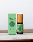 Rosemary pure essential oil in 10 mL bottle with bamboo wood top next to box packaging.