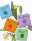 Small batch Hydrate, Nourish, Purify, and Restore shampoo bars shown in colorful box packaging.