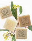 Small batch, hand-cut Hydrate, Nourish, Purify, and Restore shampoo bars.