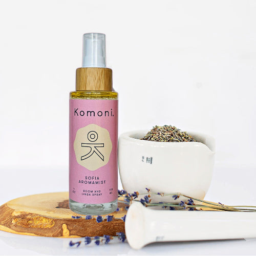 4 oz. pump spray bottle of Sofia Aromamists with wooden top with lavender, patchouli, and chamomile essential oils.