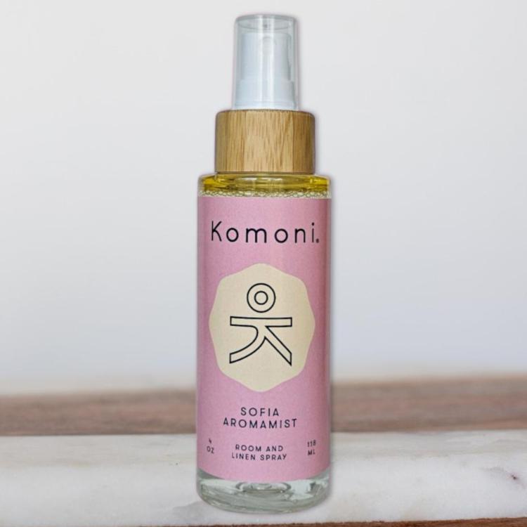 4 oz. pump spray bottle of Sofia Aromamists with wooden top with lavender, patchouli, and chamomile essential oils.