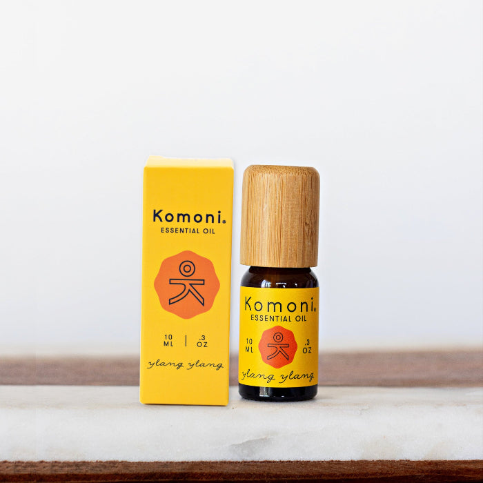 Ylang-Ylang pure essential oil in 10 mL bottle with bamboo wood top.