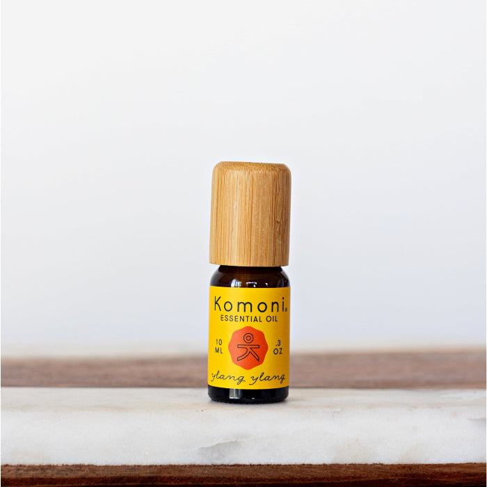 Ylang-Ylang pure essential oil in 10 mL bottle with bamboo wood top.